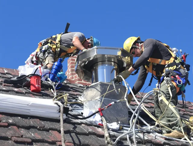 Protective chimney cap installed by South Windsor Chimney Sweep in South Windsor, CT