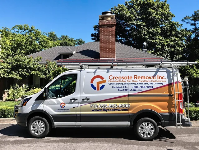 South Windsor Chimney Sweep technician removing creosote safely in South Windsor, CT